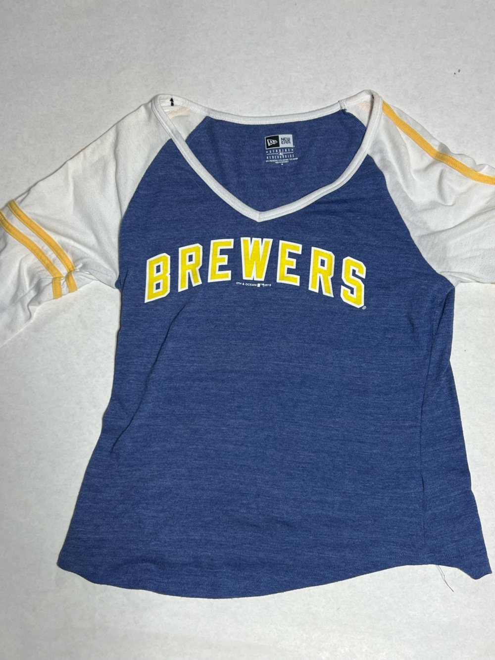 Women’s Milwaukee Brewers New Era Half sleeve shirt size medium.